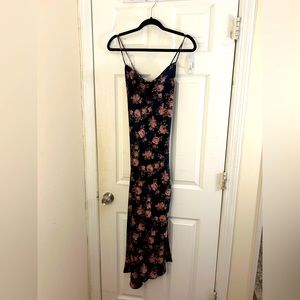 Black, floral silky dress with an open cross back